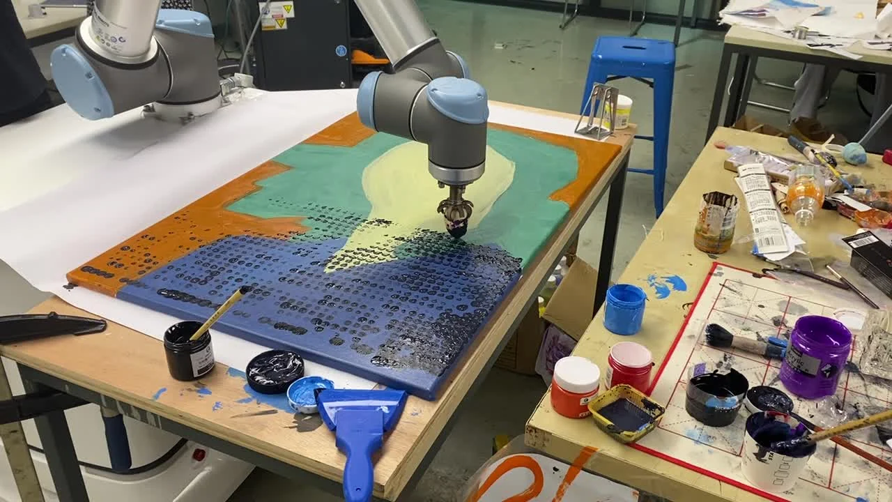 A UR5 robot paints a layered portrait using a sponge end effector