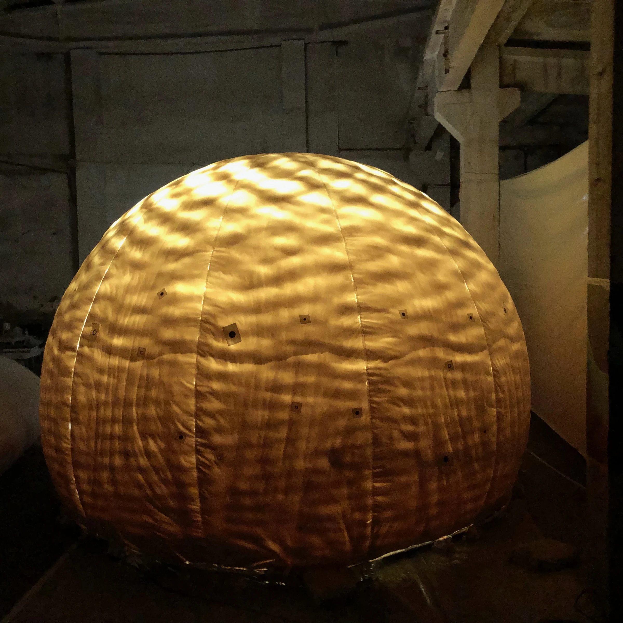 Interior illumination reveals the deposited polyurethane pattern through the exterior PVC membrane