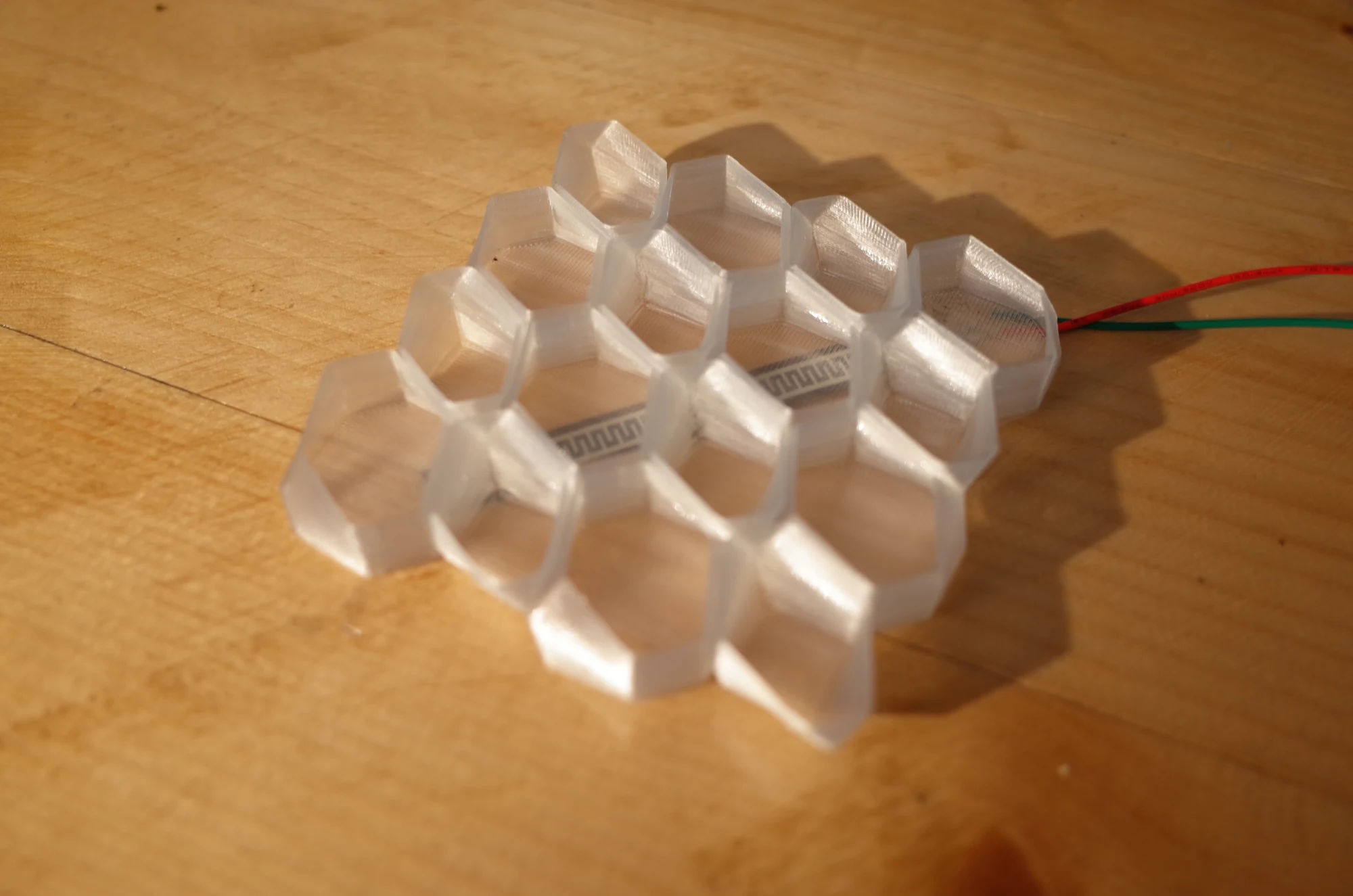 Printed cell assembly with an embedded flex sensor