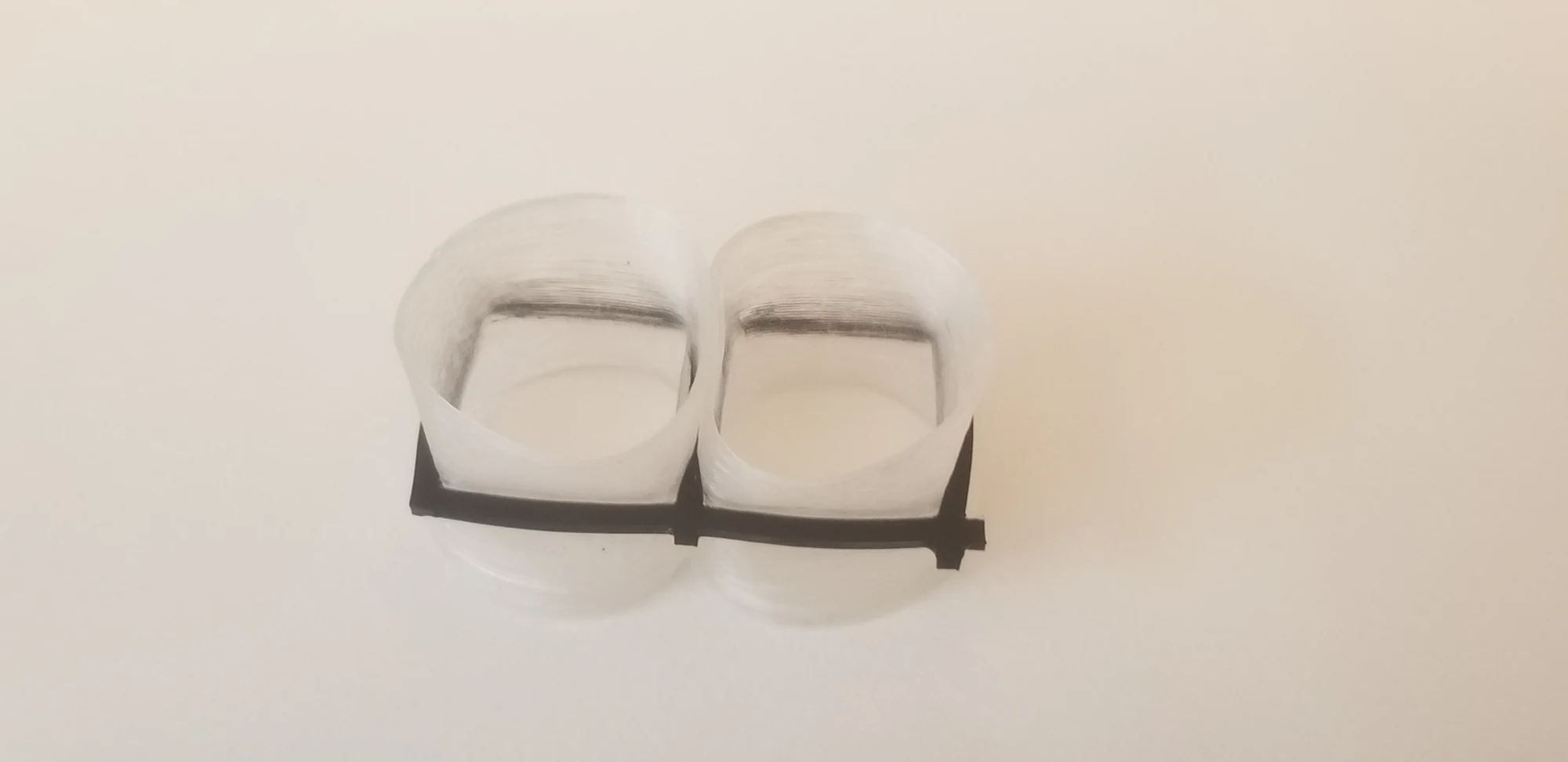 Two-cell material prototype within a constraint frame
