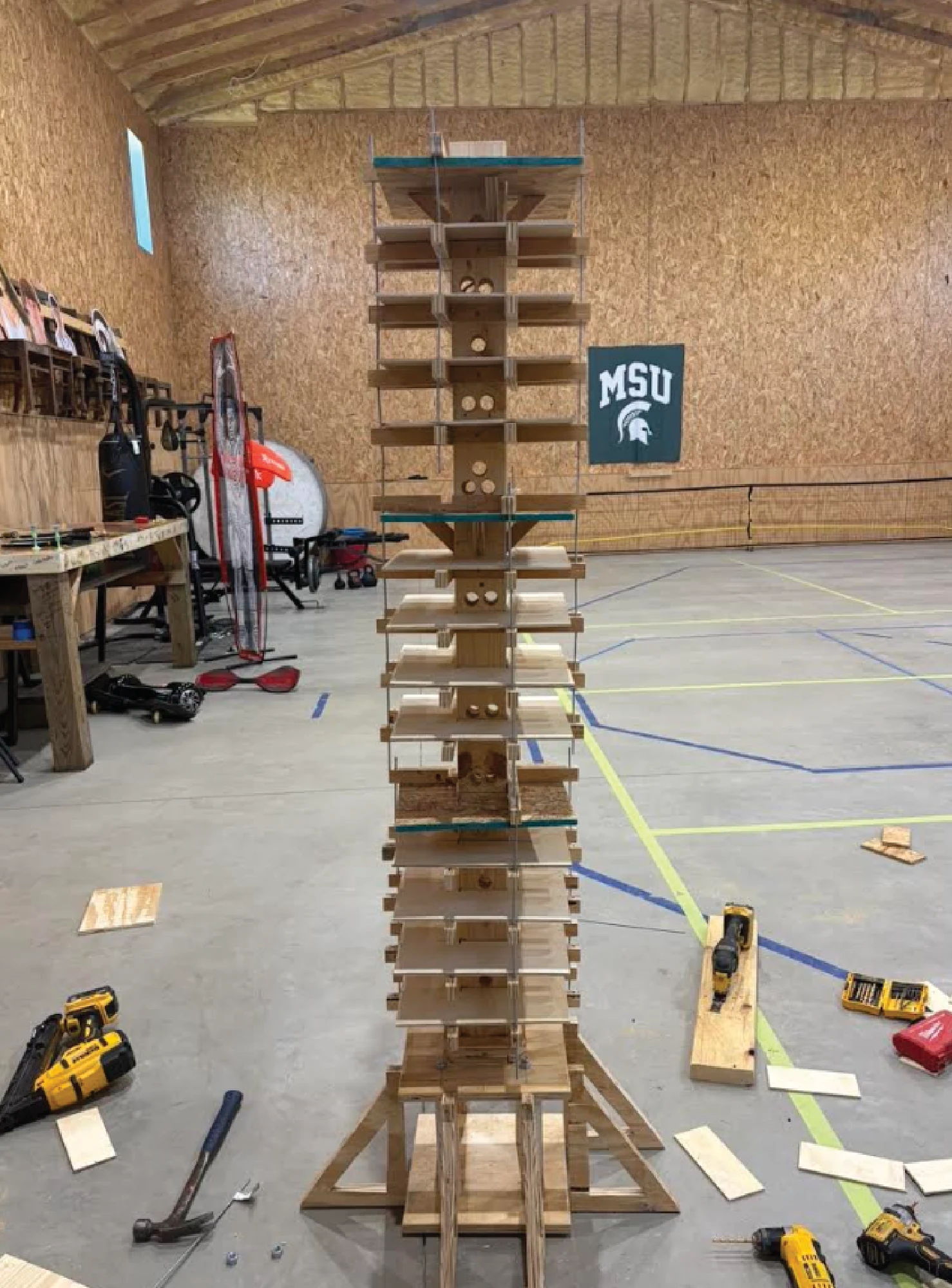 Joseph Pitsch, Timotej Murcko, Max Patino, Nick Ceccardi, and Anna Matushevskiy — completed core tower with grouped suspended floors