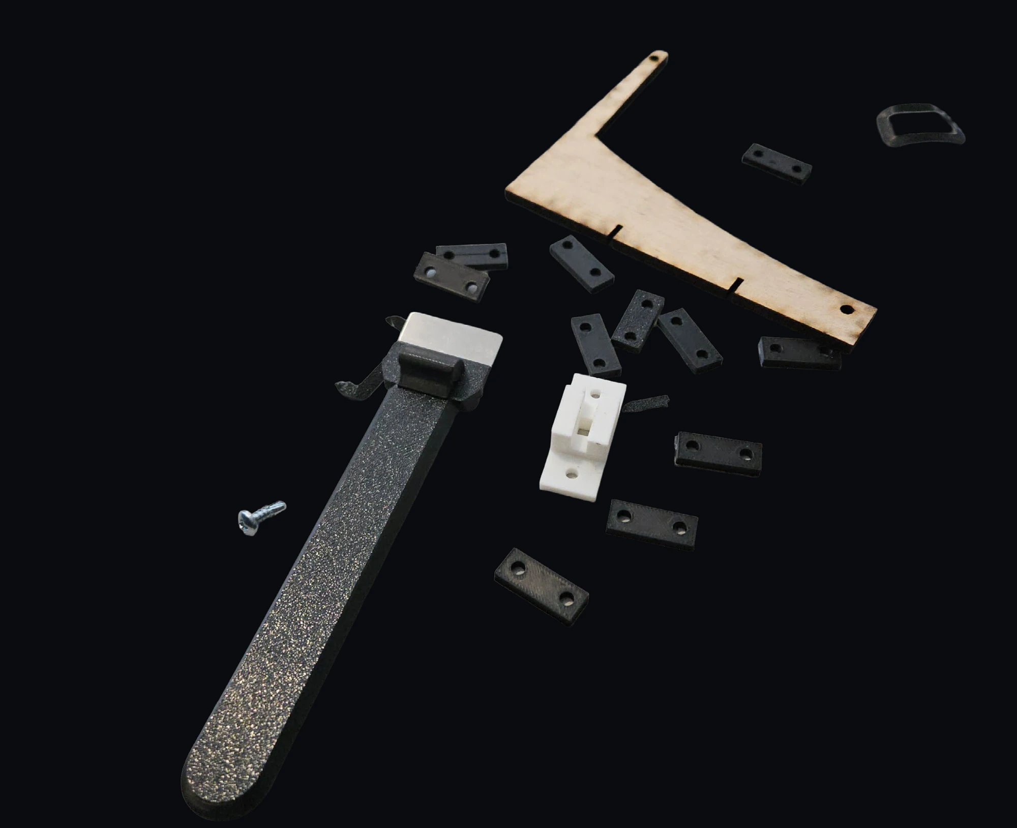 Dylan Ries and Tadhg McDonald — laser-cut frame members, printed plates, and pins