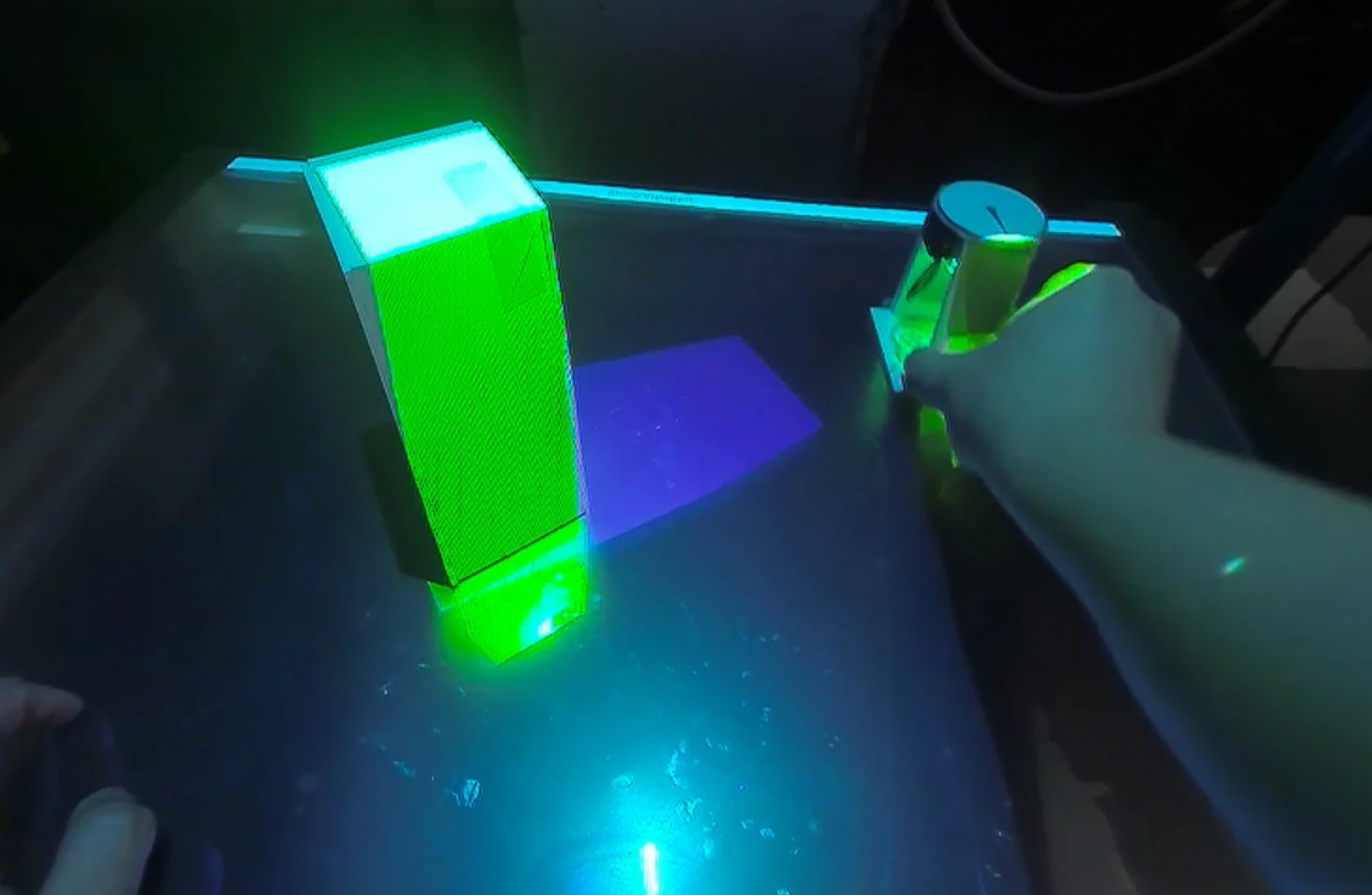 CuBe massing objects and their projected shadows on the tabletop