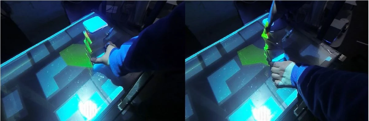 Two views of a user deforming the twisting CuBe block during a shadow study