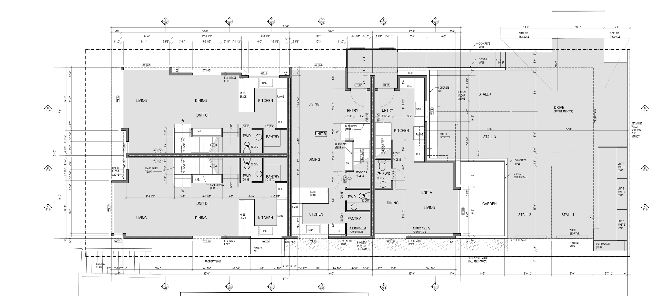 First-floor plan, with living spaces, kitchens, entrances, and uphill parking.