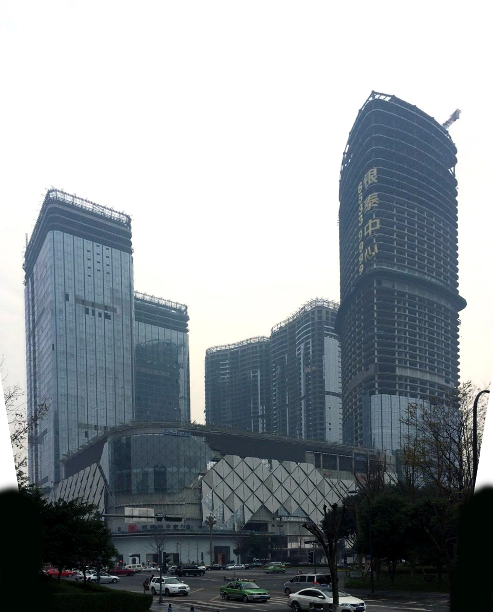 Overall view of the towers and podium during construction